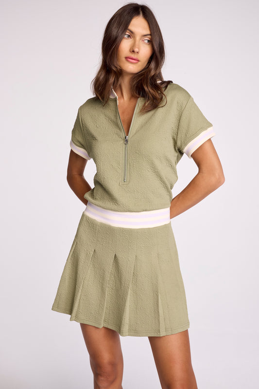 The Marigold Dress is your new go-to. Made in our crinkle french terry fabric you know and love, this tennis dress is sure to elevate your style on and off the court. Offers a comfortable and breathable fit and finishes right at the mid-thigh.